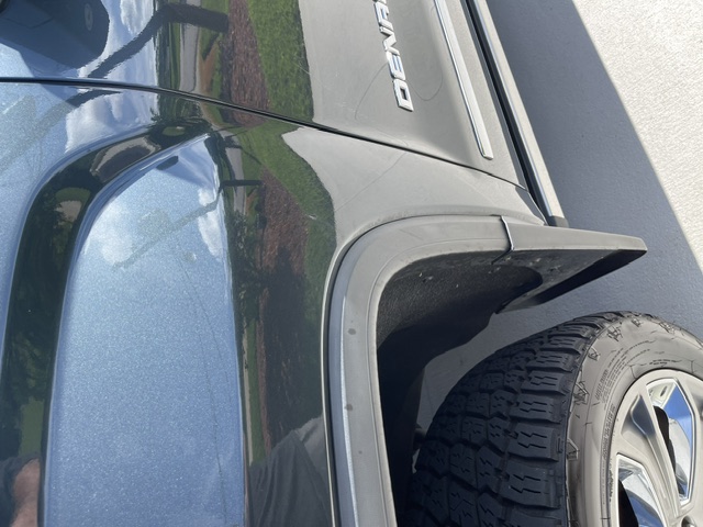 Dark front fender and wheel arch detail